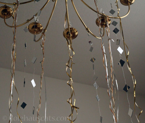 Ribbons on the chandelier, 2025 © Colehauscats.com